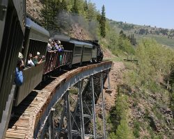 Definitely a long way down - 137 feet, to be exact. Cascade Creek Trestle, built in 1889 to replace the original timber trestle, is 408 feet long and was built by the Keystone Bridge Company.