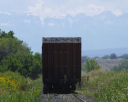 Heading on down the line with the mighty San Juans visible in the background