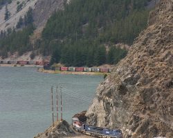 Another shot of 4653 along the lake, this time with a brief hint of sunlight.