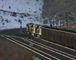 UP works up through West Kyune with a loaded IPPX train