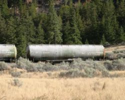 An old BCR tanker, encrusted with some sort of dirt or mineral, sits on the spur at Pavilion
