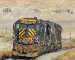 Speeding away on the mainline, the light motors head back to Helper at Mounds