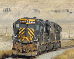 Speeding away on the mainline, the light motors head back to Helper at Mounds