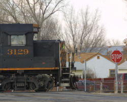 DRGW 3129 at a grade crossing in Delta