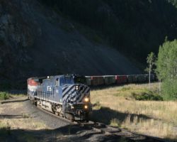SQJO rounds the curve out into sunlight just southwest of Kelly Lake