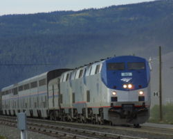 Amtrak 80 and train kick up dust into Fraser. Couldn't resist, I liked this photo.