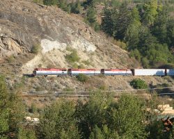The train we'll be chasing today, PGNV, sits on the cliff outside Lillooet awaiting a crew. Scheduled departure is 0910h, and it's only around 0800h.