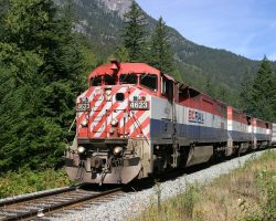 Just past the river bridge and just off the main road between Mt. Currie and D'Arcy lies a side road, offering yet another grade crossing shot of the PGNV.