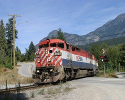 Another view of the grade crossing at Mt. Currie, with the same PGNV from Photo 107 coming through on Saturday.