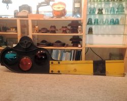 And now with the blade on, sitting in front of some of my insulator shelves