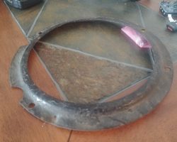 One of the the "new" roundel retainer rings to hold in the correct lenses.