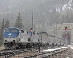The eastbound California Zephyr emerges from the Moffat Tunnel, lead by AMTK 818, one of the early P40DCs.
