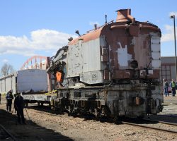 While the crew was there, they did a bit of switching around for the Forney. The steam derrick and flat were moved such that DRGW caboose 01447 and a wooden passenger car could be moved onto that storage track.