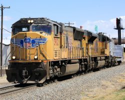 UP 3902 is wasting no time on the bypass, having just come under I-25 and approaching North Yard and the connection into the Moffat Route.