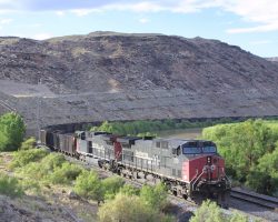 After stopping to inspect for dragging equipment near the rear of the train, SP 170 leads a loaded coal train north through Bridgeport, CO, towards Grand Junction.