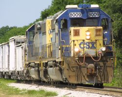 8009 and 8013 head east with an empty train bound for Green Bay.