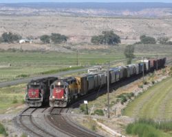Two SPs leading different trains, side by side at Roubideau