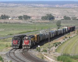 Two SPs leading different trains, side by side at Roubideau