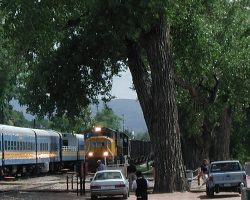 UP 4091 inches past the sitting CC&RG train with lots and lots of bell and horn.