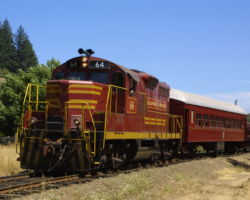 The Skunk Train leaves Willits with a load of tourists bound for Fort Bragg, on the coastline.