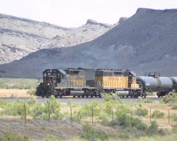 Distorted slightly by waves of 100 degree air rising off the desert ground, DRGW 5361 hustles the Potash Local back towards Brendel, UT, and the main line.