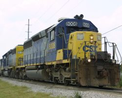 CSXT 8008 (note the white air conditioners on the cab) pulls through a curve in Mulberry on the approach to the S. Mulberry wye.