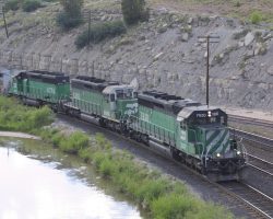 An eastbound BNSF manifest cruises through West Kyune with three green BN SD40-2s on the point - a rarer sight these days.