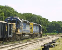 8004 east sits and waits for a westbound load at the east end of Edison Junction.