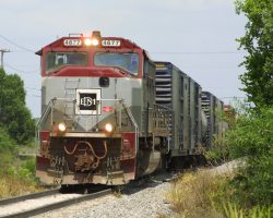 A mixed load heads east through Bradley Junction towards Tampa