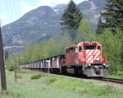 A mangey-looking SD40-2 with a ballast train, north of Hope, BC
