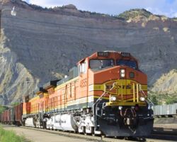 An eastbound BNSF manifest follows right on the heels of the Utah train in photos 36 and 37.