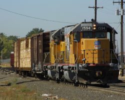 Two UP GP15s switch cars around at the east end of Roseville. There are quite a few parking spaces on the yard side of the road here, and the light is great until mid-afternoon.