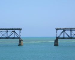 The missing segment near the north end shows how the highway deck was tacked on to the existing bridge superstructure. The northernmost (right) side spans are still a fishing dock that visitors can walk out onto from Bahia Honda State Park.