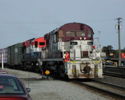 Two Cat-repowered RS18s work the North Van Yard before the Whistler Northwind departs.