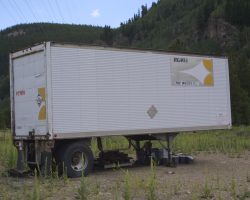 An oddity stored at Pando - an old Rio Grande Motorways trailer, presumably holding M-o-W stuff left over from the Rio Grande era.