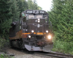 Halfway to Squamish, BC 1700 squeals its way around a tight corner at Lion's Bay