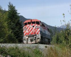 BC Rail 4605, along with 7 other units, pulls south around milepost 116.