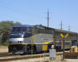 Amtrak 2007 pushes a westbound commuter train at Martinez on 21-Aug-2001.
