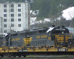 3006 and 3002 sit in the Whittier yard awaiting a crew and their next task.