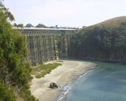There are, after all, other things in life to photograph besides trains. This is a large, mostly-wooden trestle that carries Highway 1 over a beautiful blue ocean cove somewhere between Fort Bragg and Bodega Bay.