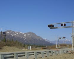 An ARR grade crossing near Summit, AK, powered completely by the sun and wind.