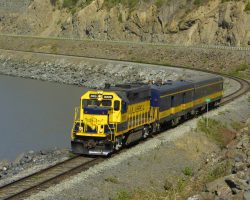 3009 leads the Whittier passenger run south near Rainbow on 23-May.