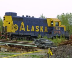 Two of these old, retired GP7u rest at a scrap dealer next to the Anchorage yard, the last of their class in Alaska.