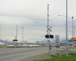 Look carefully, that's not a railroad crossing, though it looks a lot like one. This sits on a taxiway at the Anchorage airport.