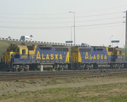 The air thick with smoke from the Chena Hot Springs Road forest fire, 2004 and 2005 are out moving around the yard, preparing to grab a cut of empty tankers for the North Pole refinery.