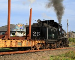 Something about a steam engine, log cars, and an oceanfront resort just don't quite mesh in my mind.