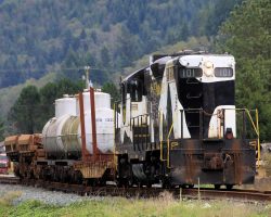 POTB 101 - a GP9 built as C&O 6606 and now wearing the distinctive Holstein paint - pulls our photo freight cars into Garibaldi.