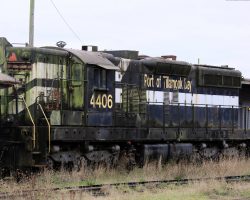 One of the few remaining SP SD9s on the railroad, POTB 4406 sits by the blimp hanger. It's probably a sign it hasn't moved in a while when there's green stuff growing on the shady side of the locomotive.