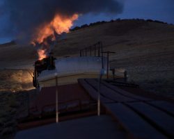 Coming across the desert before sunrise, the firebox would illuminate the exhaust plume any time the fireman opened the doors.