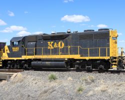 WAMX 3827 was built as Missouri Pacific 576 in October 1966. She's still going and back on home rails today. Note the spark arresters to keep the non-turbo'd prime mover from throwing sparks and starting fires.